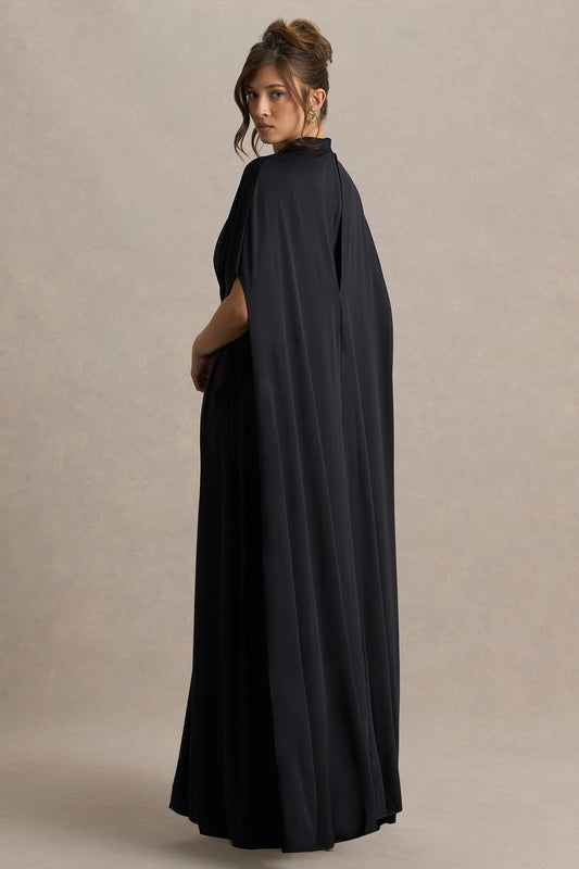 Olessia | Vestido negro con mangas tipo capa y cinturón con detalles dorados