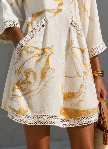 Aliënor | Vestido mini de lino con motivos dorados y escote en V
