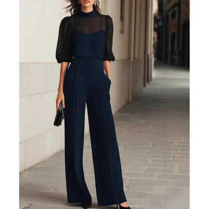 Completo Nadie blu navy: blusa trasparente e pantalone ampio a vita alta, vista frontale
