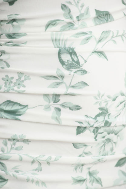Clementina | Vestido largo verde con estampado de porcelana y manga tipo capa asimétrica