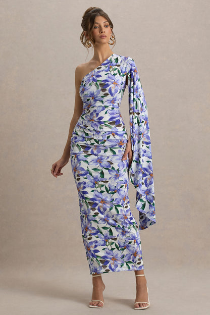 Clementina | Vestido largo con estampado de lirios y manga capa asimétrica drapeada