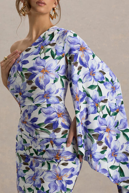 Clementina | Vestido largo con estampado de lirios y manga capa asimétrica drapeada