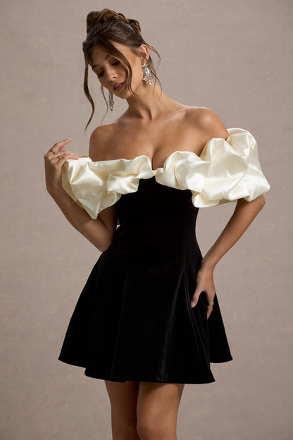 Brynne | Vestido corto de terciopelo en negro y crema con mangas abullonadas de satén.