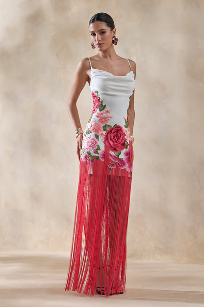Bejewelled | Vestido largo blanco con flores rosas, escote drapeado tipo cowl y bajo con flecos