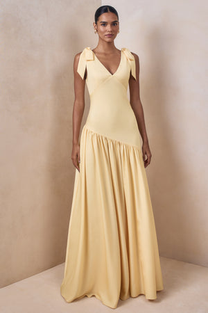 Cala | Vestido Largo de satén color limón con escote pronunciado y mangas con lazo