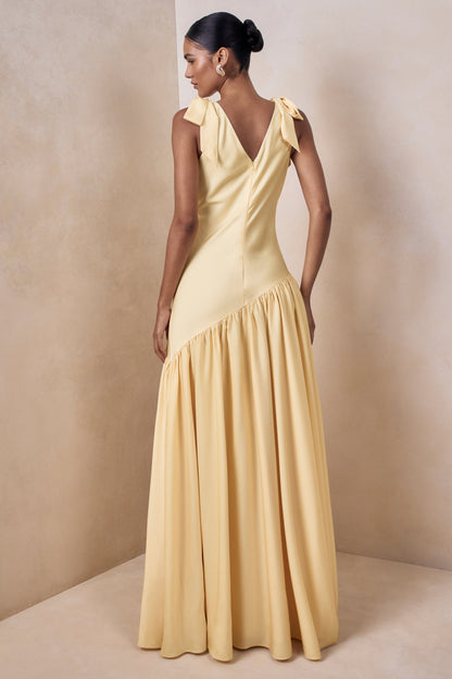 Cala | Vestido Largo de satén color limón con escote pronunciado y mangas con lazo