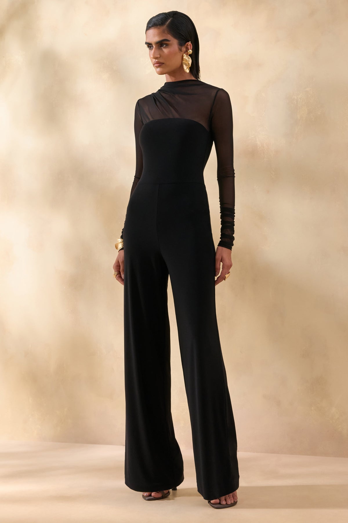 Emeria | Negro Cuello Alto Mono con Mangas Largas de Malla