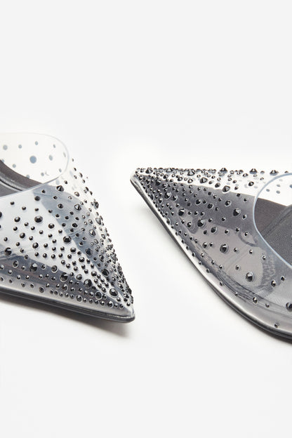 Covergirl | Tacones negros y transparentes con brillantes