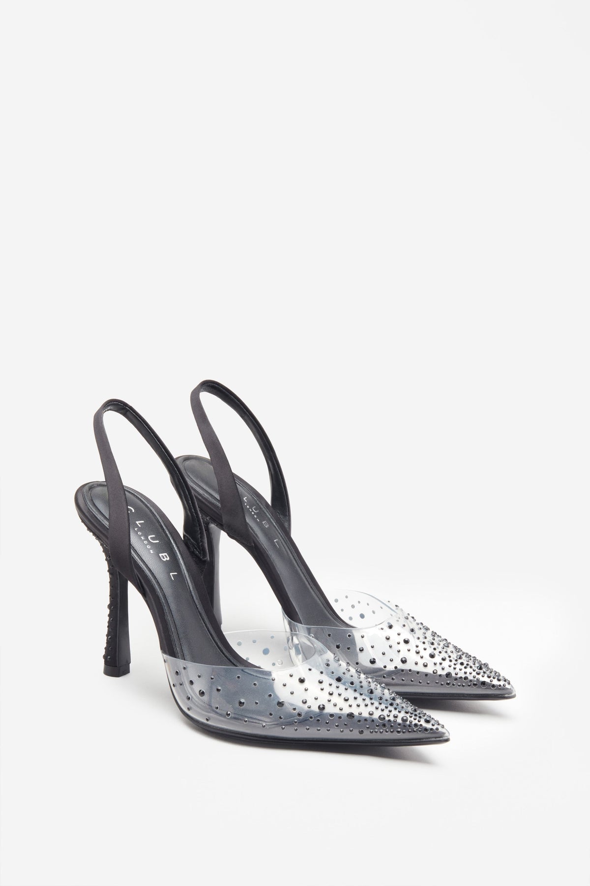 Covergirl | Tacones negros y transparentes con brillantes