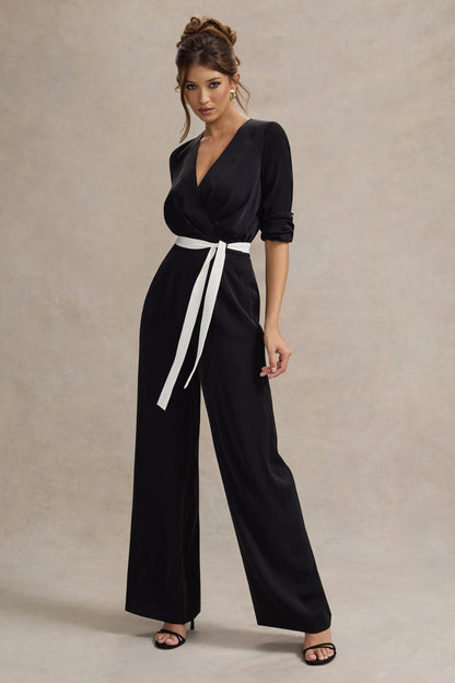 Ruba | Mono negro con escote en V y cinturón en blanco