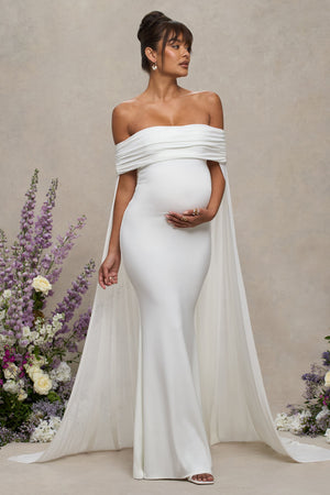 Carlotta | Vestido largo en blanco de maternidad con escote bardot y capa trasera