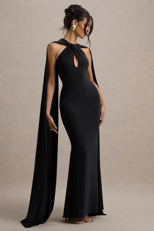 Rhoda | Vestido largo negro con escote halter torcido y capa