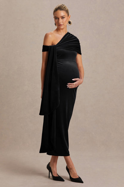 Zena | Vestido Midi Premamá de Terciopelo Negro con Escote Asimétrico y Detalle de Nudo y Fajín