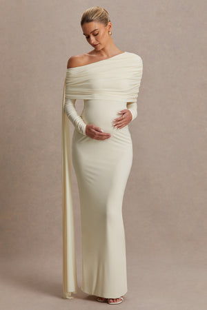 Cyra | Vestido largo crema con escote asimétrico y fajín