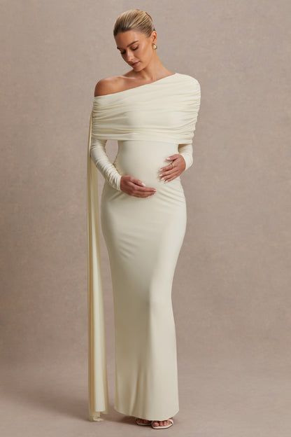 Cyra | Vestido largo crema con escote asimétrico y fajín