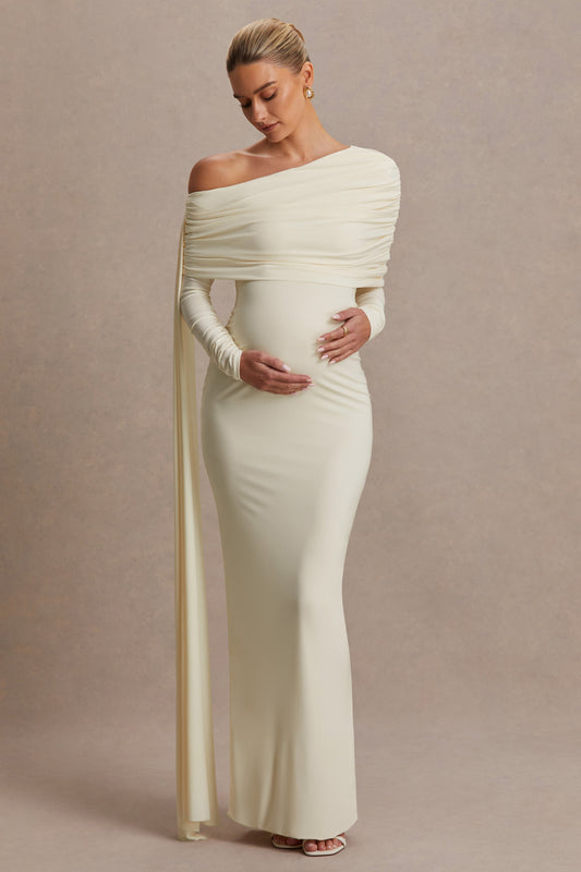 Cyra | Vestido largo crema con escote asimétrico y fajín