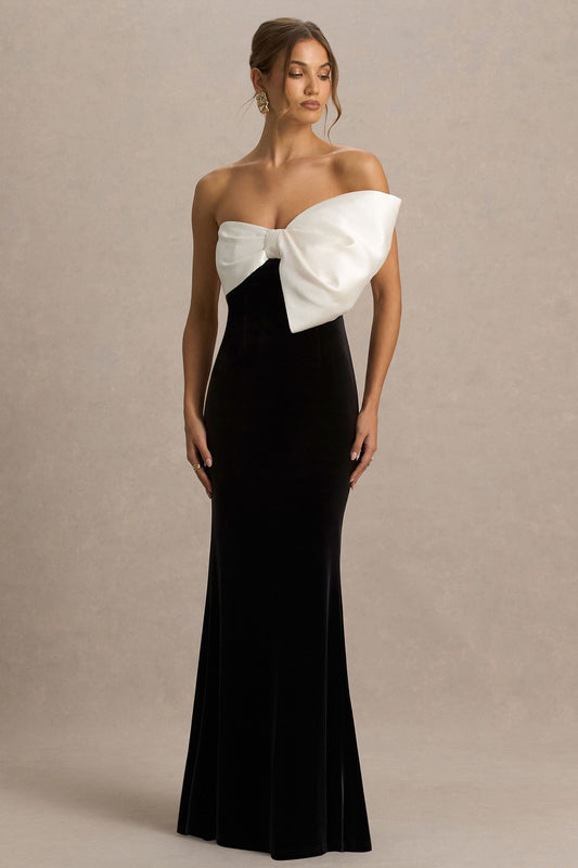 Divulge | Vestido largo de terciopelo negro y blanco con escote asimétrico y detalle de lazo