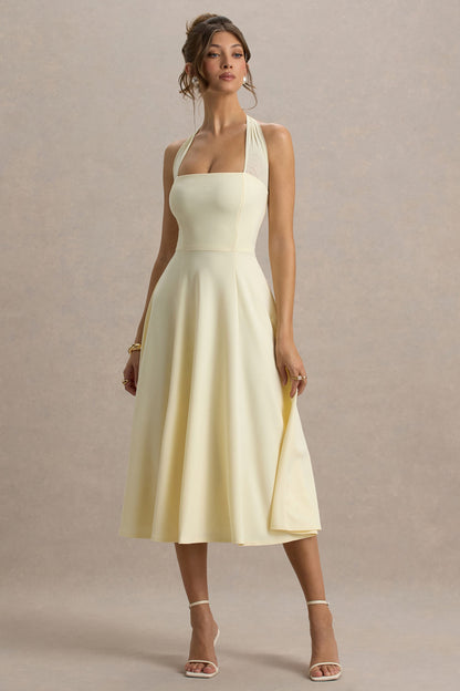 Auburn | Vestido midi amarillo pastel con escote halter de malla con lazo
