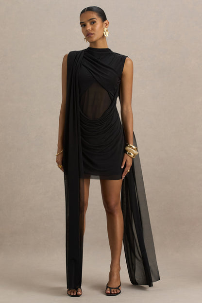 Riad | Vestido corto negro de gasa con cuerpo transparente y capa de mangas dobles.