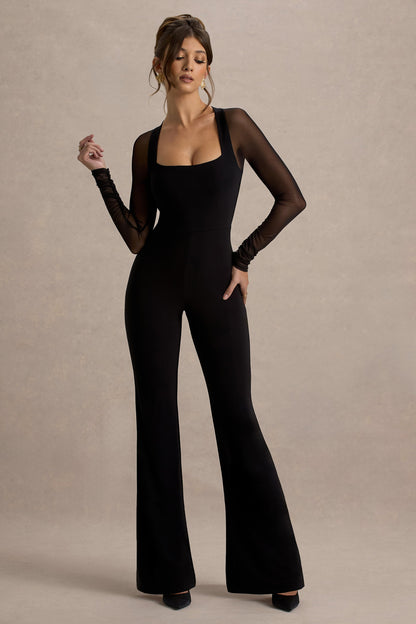 On Track | Mono negro de pierna acampanada con mangas transparentes