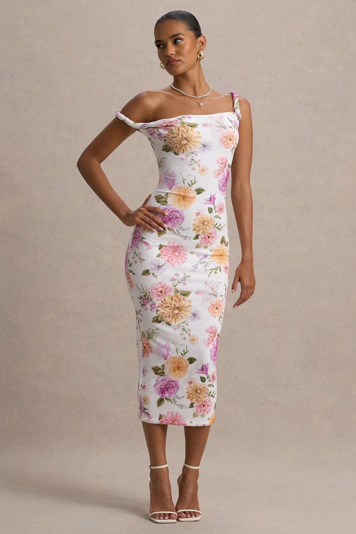 Nora | Vestido midi ajustado con escote asimétrico con detalle torcido con estampado floral