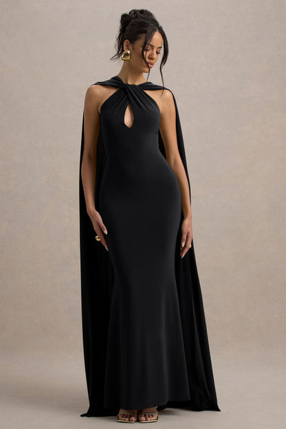 Rhoda | Vestido largo negro con escote halter torcido y capa