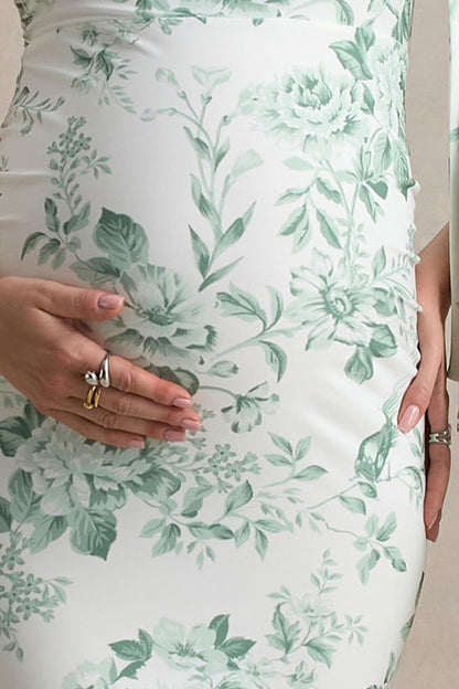 Aliana | Vestido largo premamá con una manga larga y estampado floral verdoso