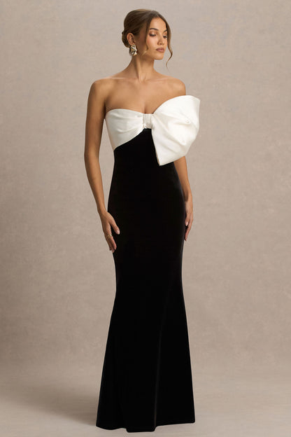 Divulge | Vestido largo de terciopelo negro y blanco con escote asimétrico y detalle de lazo