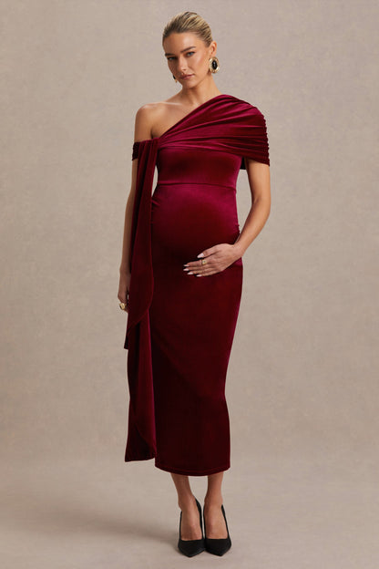 Zena | Vestido Midi Premamá de Terciopelo Burdeos con Escote Asimétrico y Detalle de Nudo y Fajín