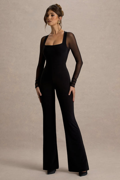 On Track | Mono negro de pierna acampanada con mangas transparentes