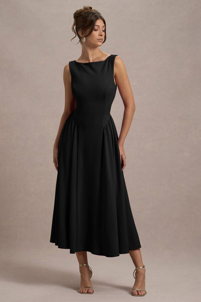 Muriel | Vestido midi negro con escote barco y bajo con volumen