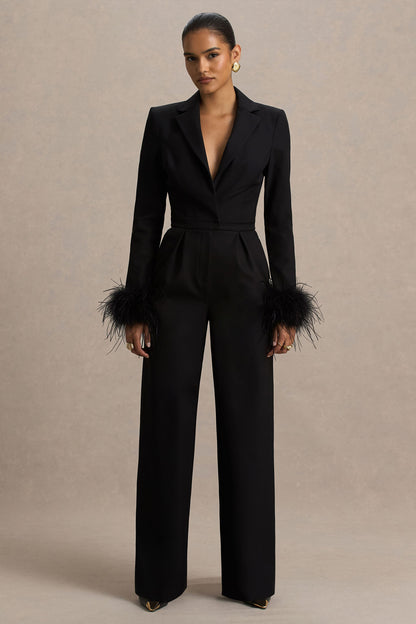 Lissy | Mono negro con escote en forma de V y mangas adornadas con plumas