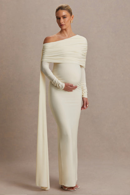 Cyra | Vestido largo crema con escote asimétrico y fajín