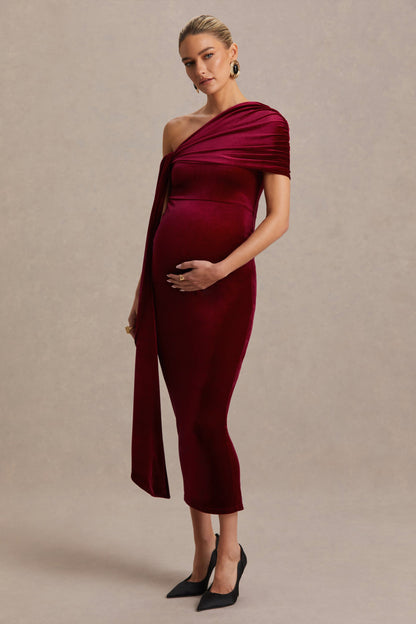 Zena | Vestido Midi Premamá de Terciopelo Burdeos con Escote Asimétrico y Detalle de Nudo y Fajín