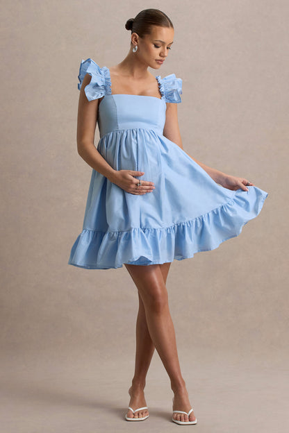 Dolly Daze | Vestido corto premamá en azul claro con detalle de volantes
