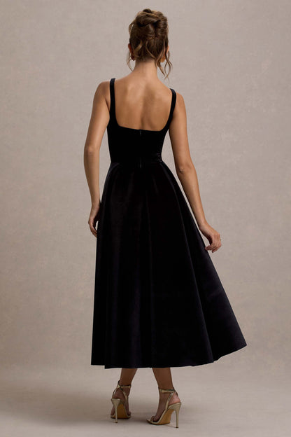 Francisca | Vestido Midi en terciopelo negro con falda plisada y volumen