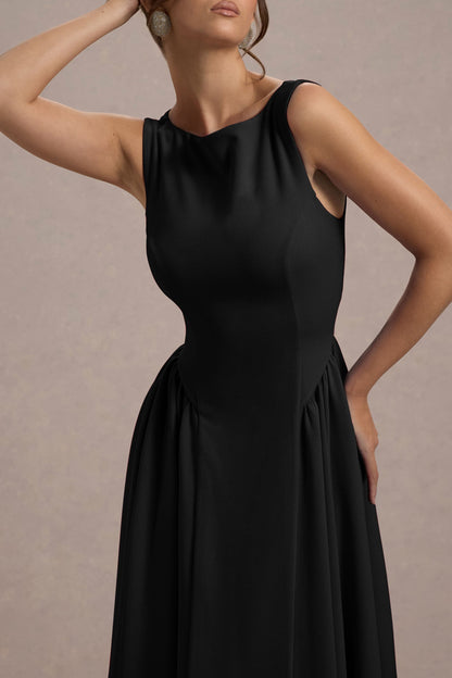 Muriel | Vestido midi negro con escote barco y bajo con volumen