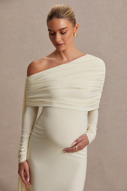 Cyra | Vestido largo crema con escote asimétrico y fajín
