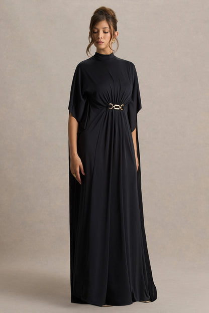 Olessia | Vestido negro con mangas tipo capa y cinturón con detalles dorados