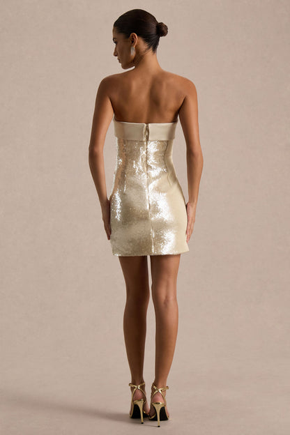 Casandra | Vestido corto de lentejuelas champagne con escote bandeau y detalle de satén