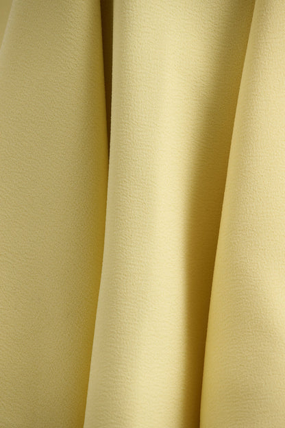 Gabrielle | Vestido corto amarillo limón de cuello alto con detalle fruncido