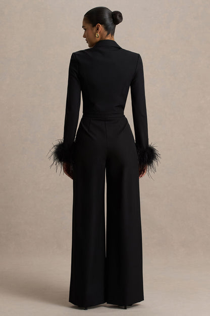 Lissy | Mono negro con escote en forma de V y mangas adornadas con plumas