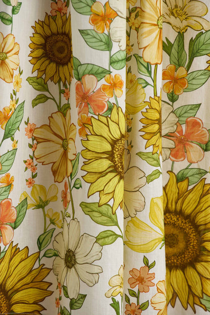 Ivory | Vestido midi asimétrico con escote bandeau y estampado de girasoles