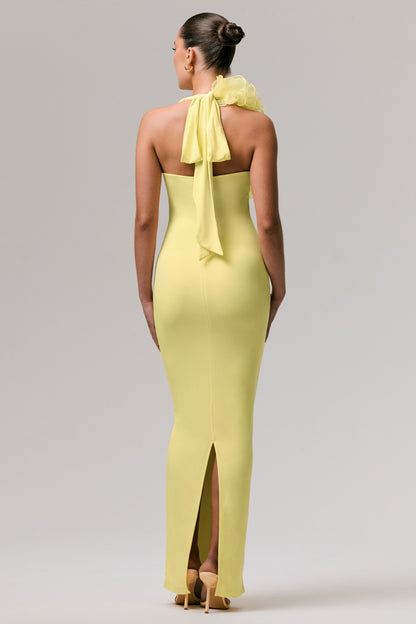 Harriet | Vestido largo amarillo con escote pronunciado y detalle floral lateral