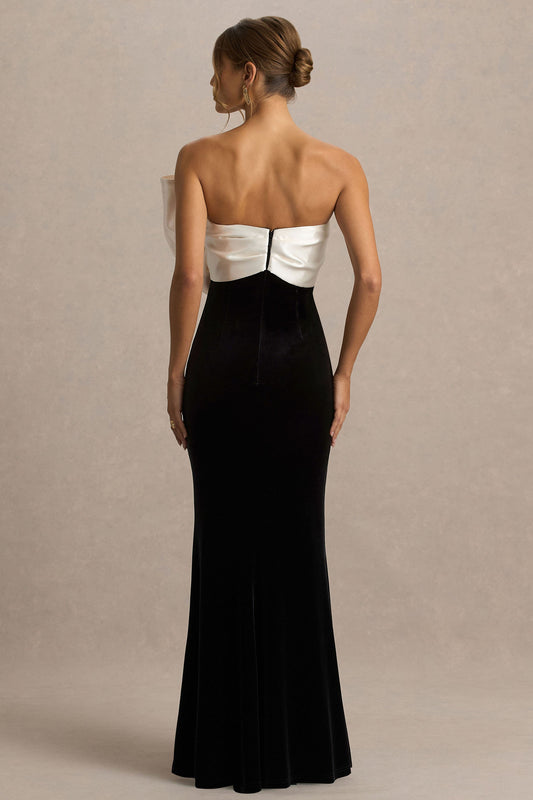 Divulge | Vestido largo de terciopelo negro y blanco con escote asimétrico y detalle de lazo