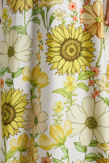 Glide | Vestido largo satinado con detalle de cuello con lazo y estampado de girasoles